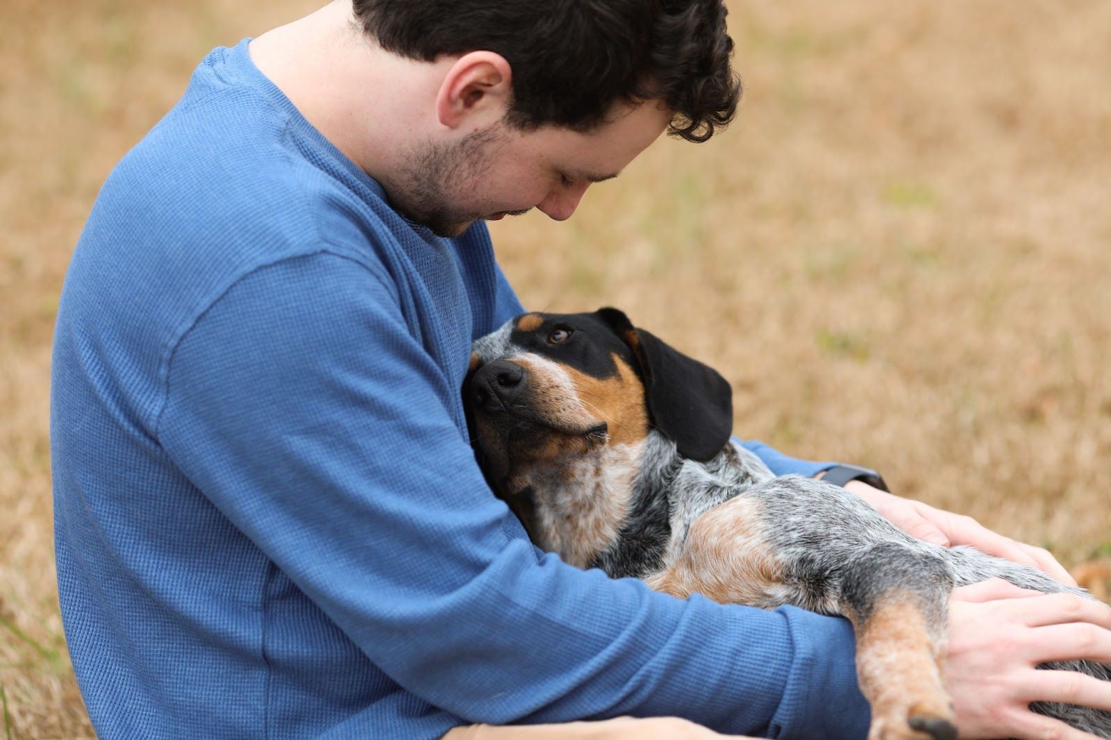 a guy with a dog
